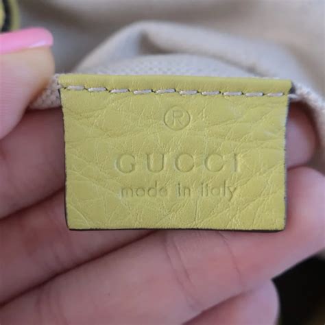 how to tell if gucci is real wallet